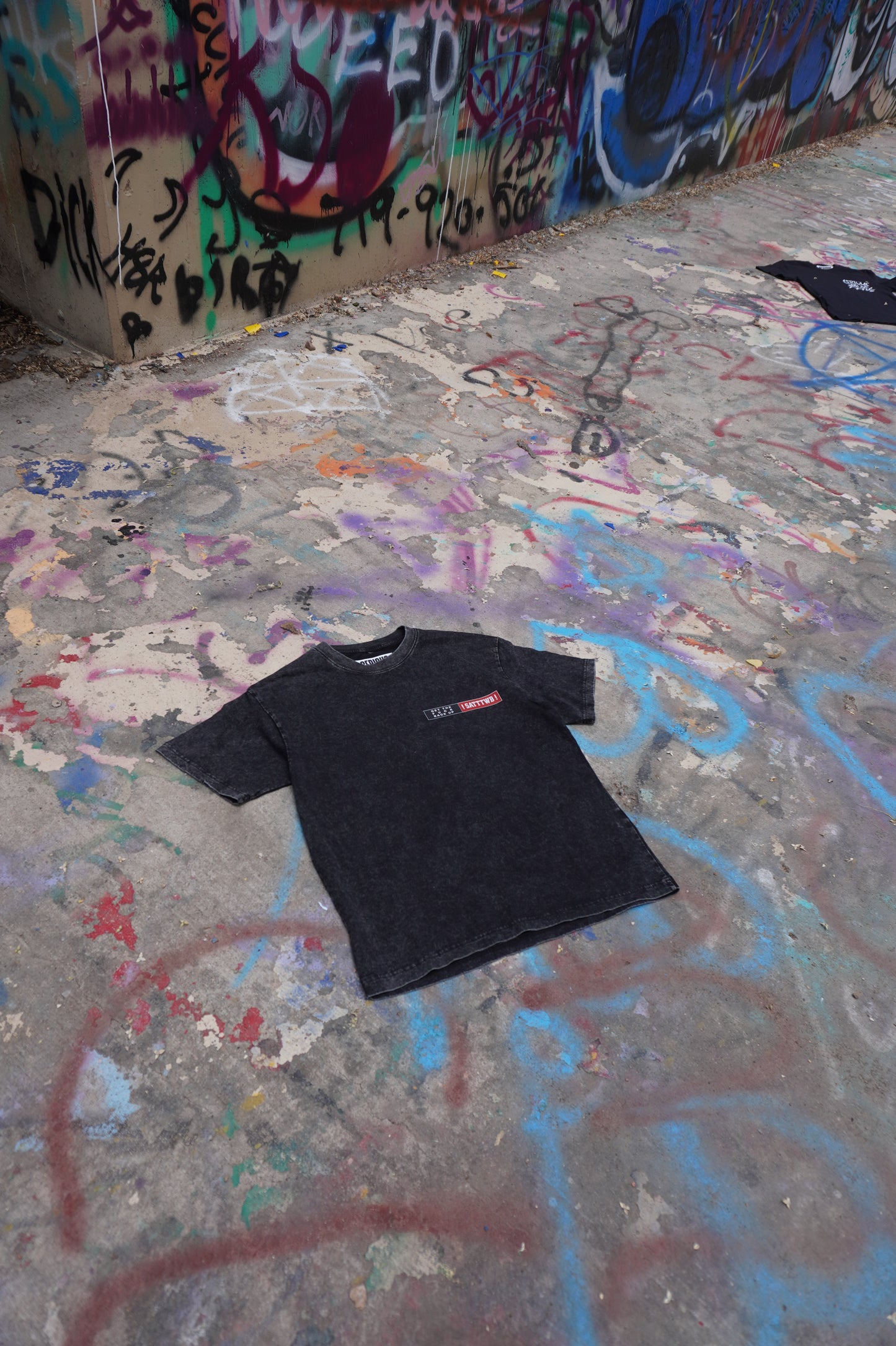 “Never Give Up”  acid washed t shirt